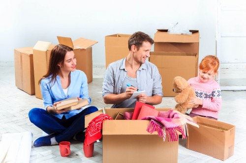 Packed boxes and furniture ready for house removals
