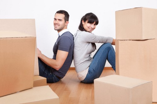 Office moving vehicle and boxes for Downe business relocation